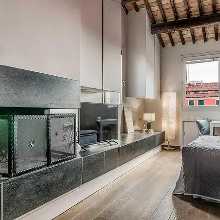 Apartmán Enjoy - Mansarda Nel Cuore Di